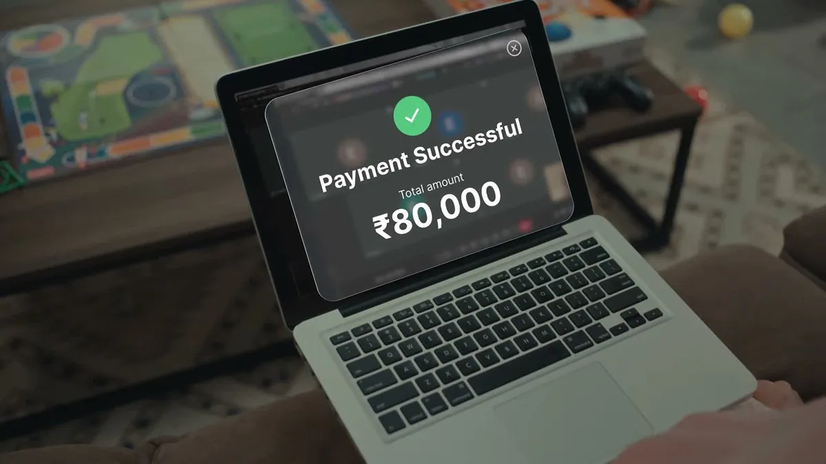 A laptop showing a completed payment of Rs 80,000 in airpay's first brand film, Invisible, marking the company's 14th year