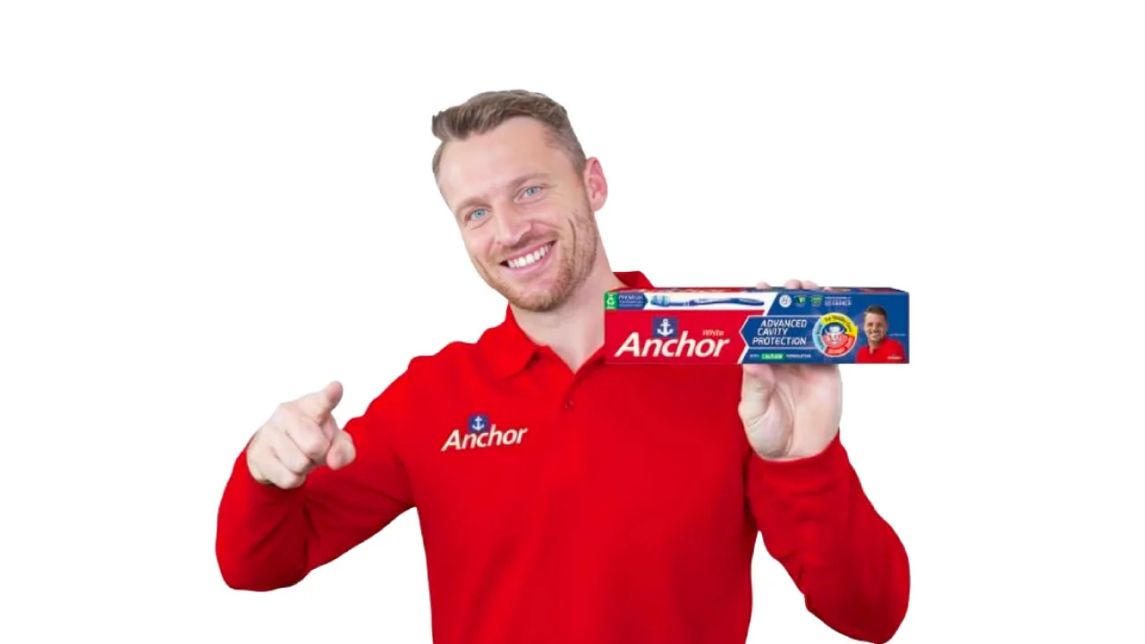 A toothbrush and a cricket bat as halftone cutouts, for Anchor Oral Care signing Jos Buttler as its brand ambassador in India