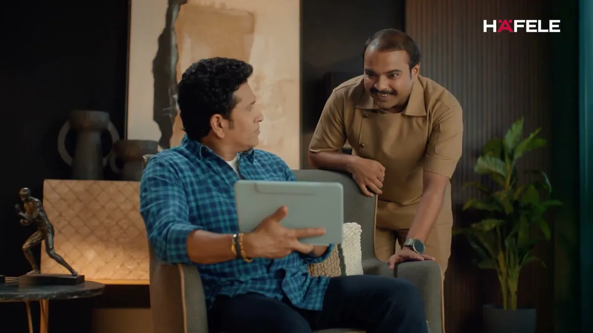 Sachin Tendulkar choosing a cabinet finish in Hafele India's second campaign film, shot at the brand's Mahalaxmi design centre in Mumbai
