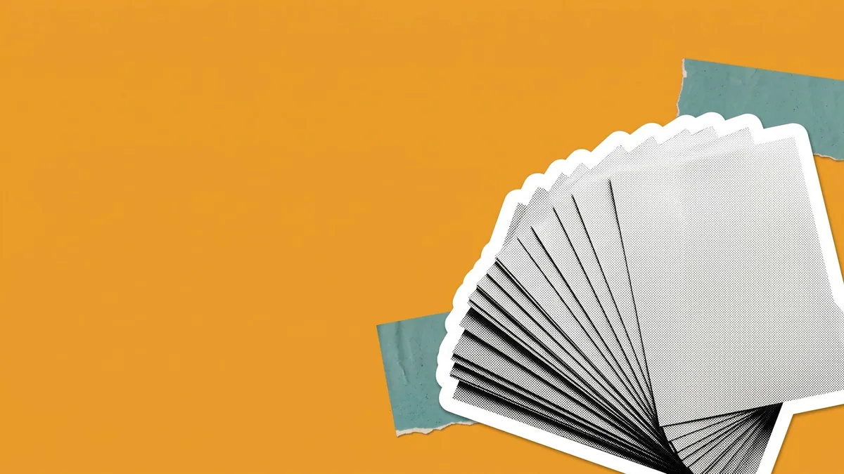 Invoices fan out in an overlapping stack pushed hard into one corner of an amber frame