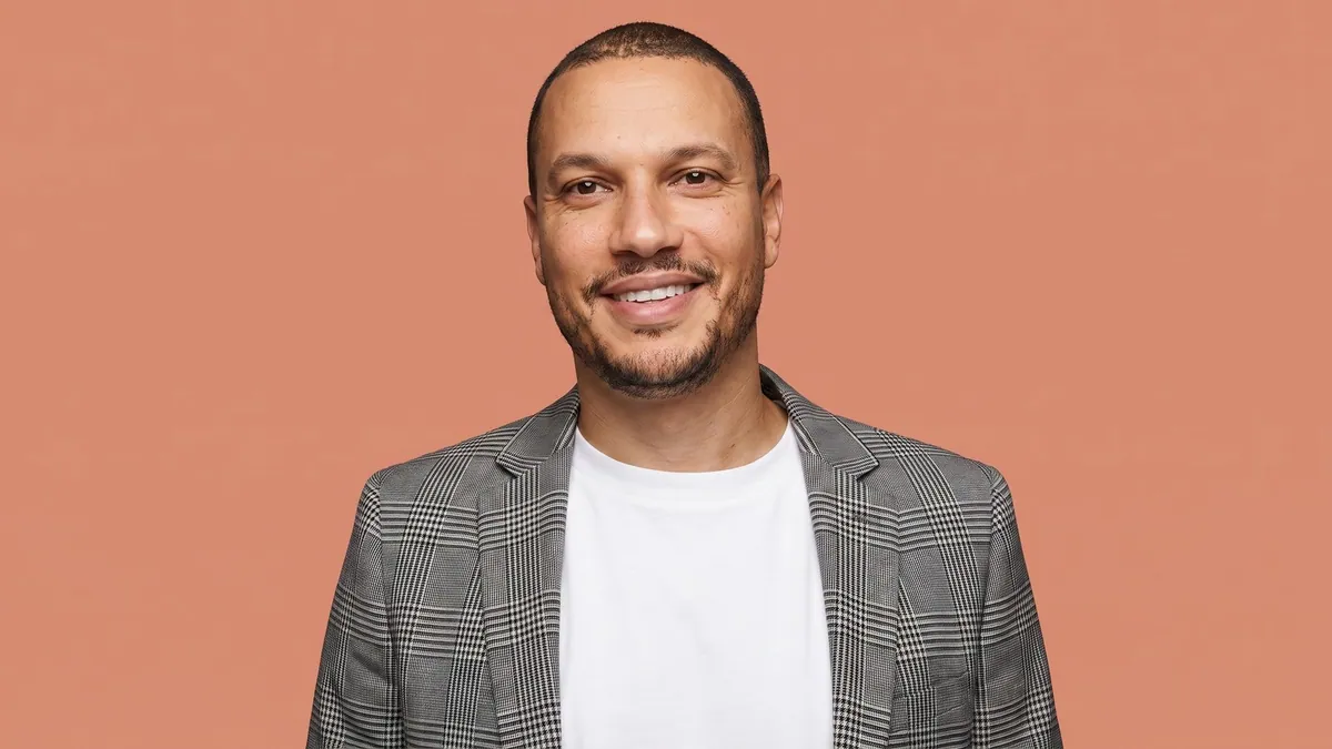 Marc Dicko, chief digital and marketing officer for L'Oréal SAPMENA, photographed against a flat terracotta background