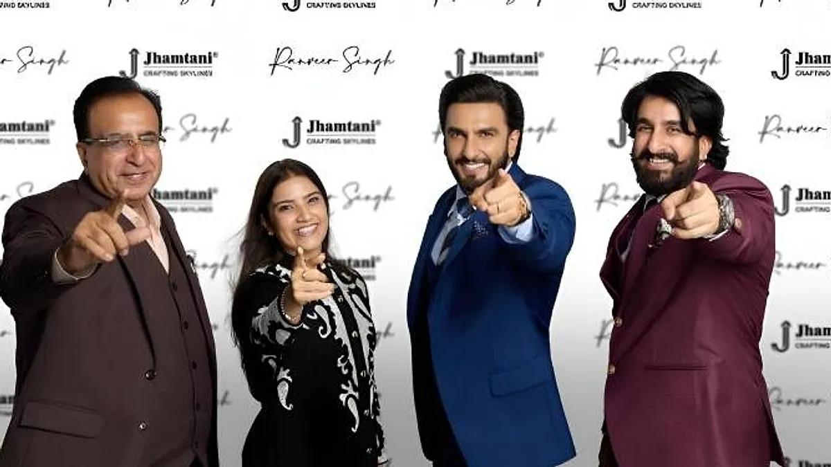 Ranveer Singh with Anup Jhamtani and two colleagues at the Jhamtani brand ambassador announcement in Pune