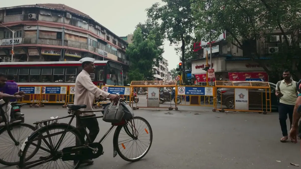 A still from the Sweet Karam Coffee campaign with Mumbai's dabbawalas