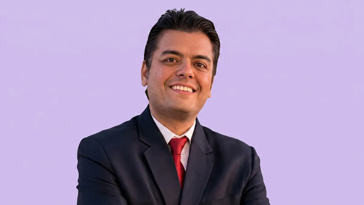 Rishikesh R Ranga, chief executive of VB Group, photographed against a flat lilac background