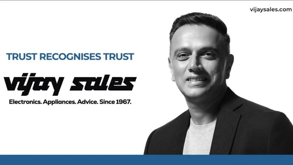 Rahul Dravid in a black jacket beside the Vijay Sales logo and the line Trust Recognises Trust in the campaign key visual