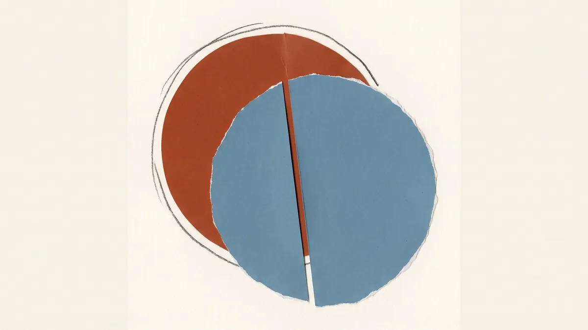 Two overlapping circles, one terracotta and one dusty blue, meeting at a hard edge